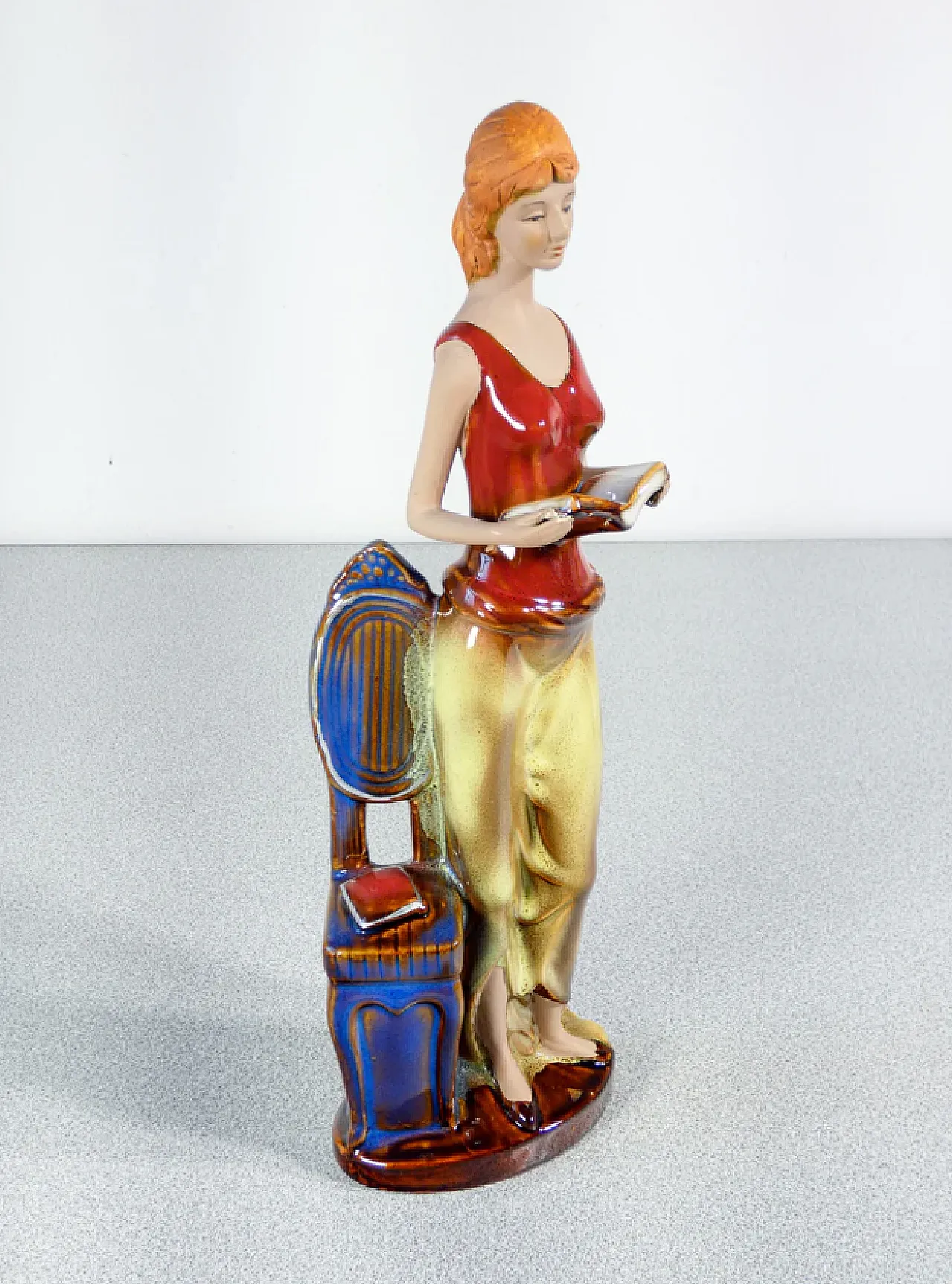 Woman with books in painted and glazed ceramic, mid-20th century 3