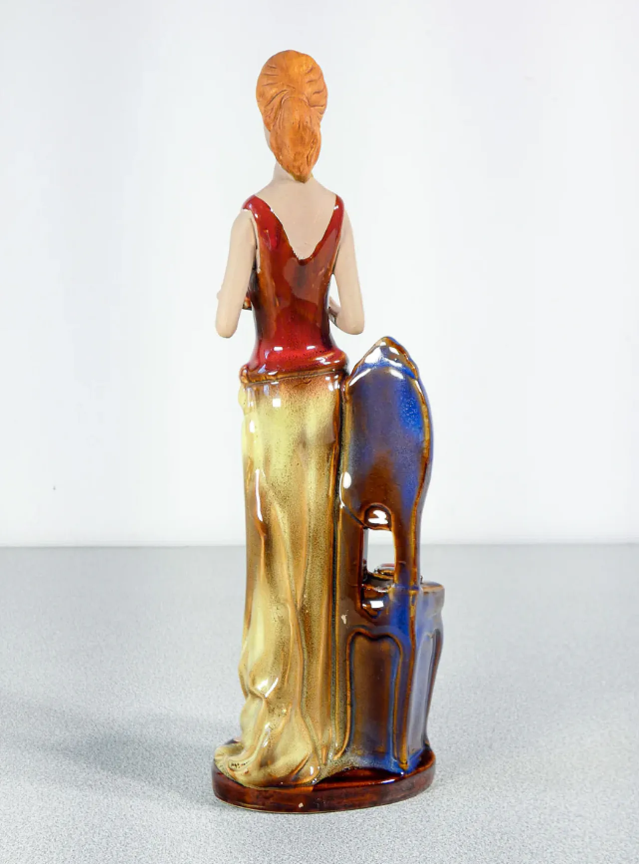 Woman with books in painted and glazed ceramic, mid-20th century 7