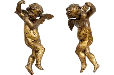 Pair of winged cherubs gilded and carved wood, Florence 16th century