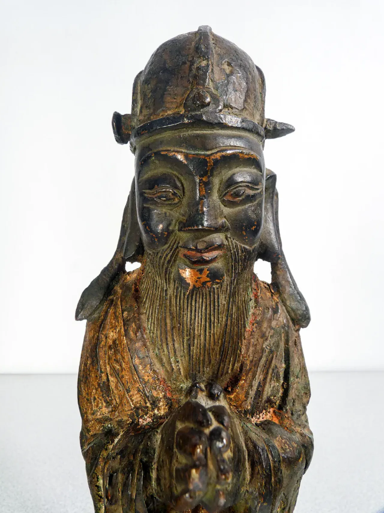 Bronze sculpture of dignitary with clasped hands, 17th century 2