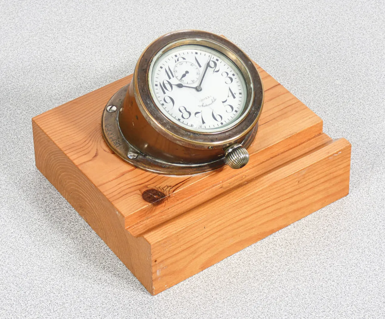 Brass clock with wooden base by Doxa, 1940s 1