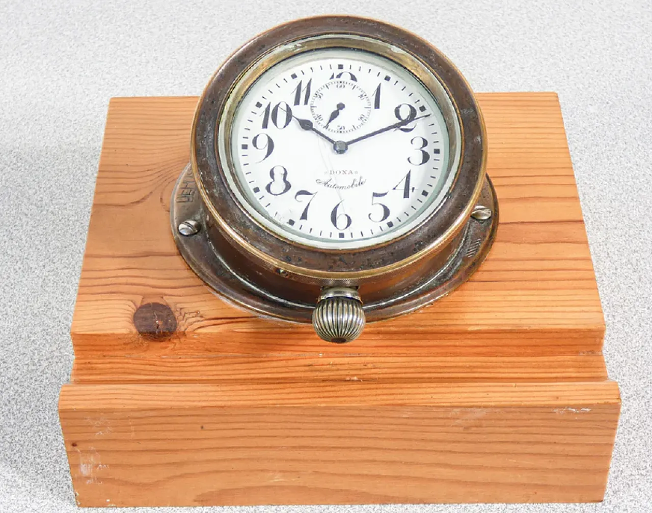 Brass clock with wooden base by Doxa, 1940s 2