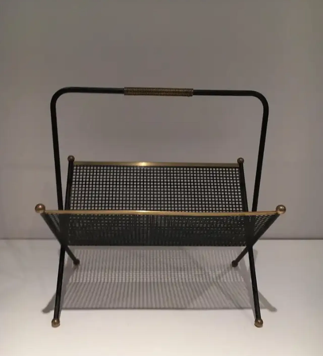 Magazine rack in lacquered perforated sheet metal and brass, 1950s 2