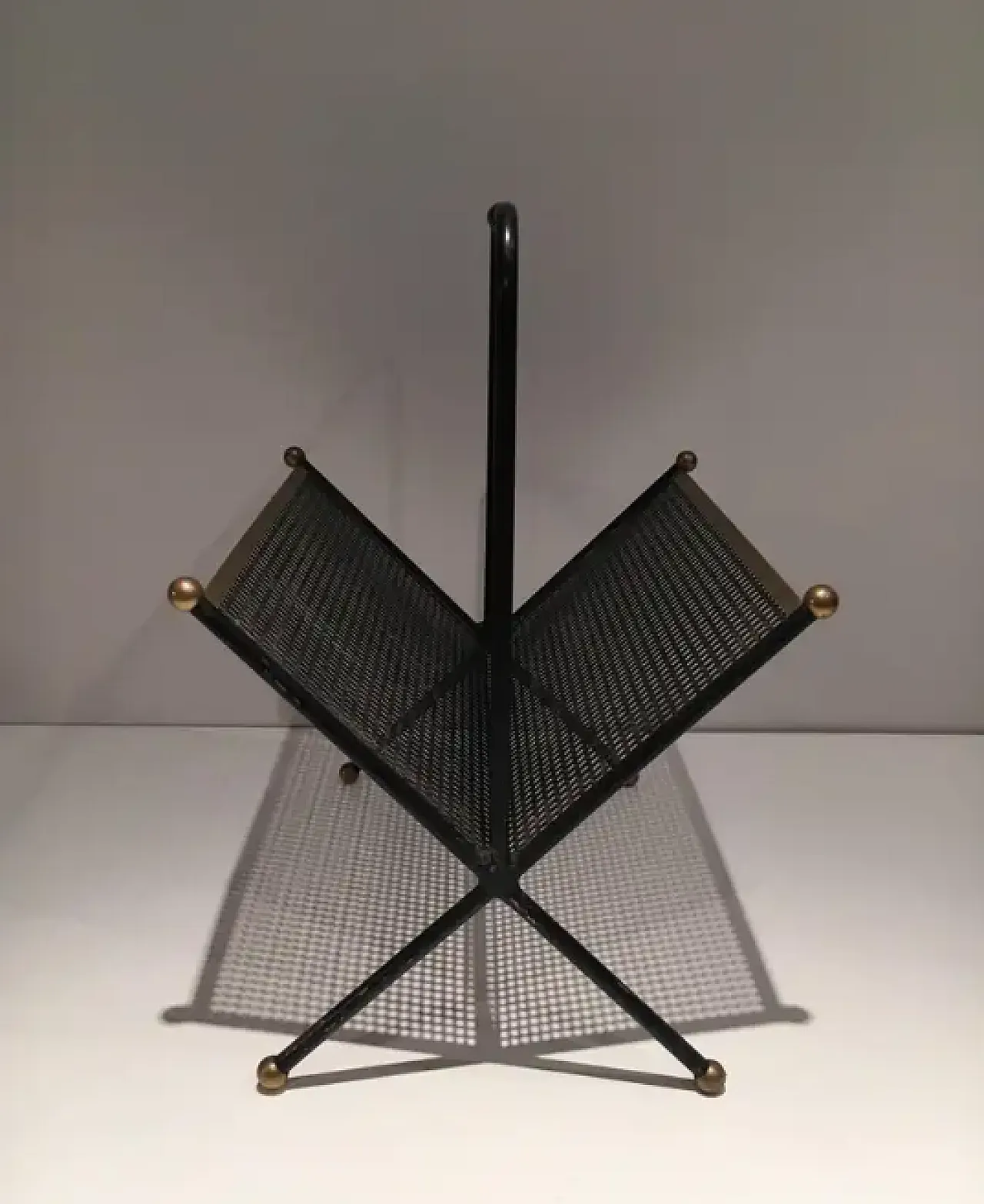 Magazine rack in lacquered perforated sheet metal and brass, 1950s 4