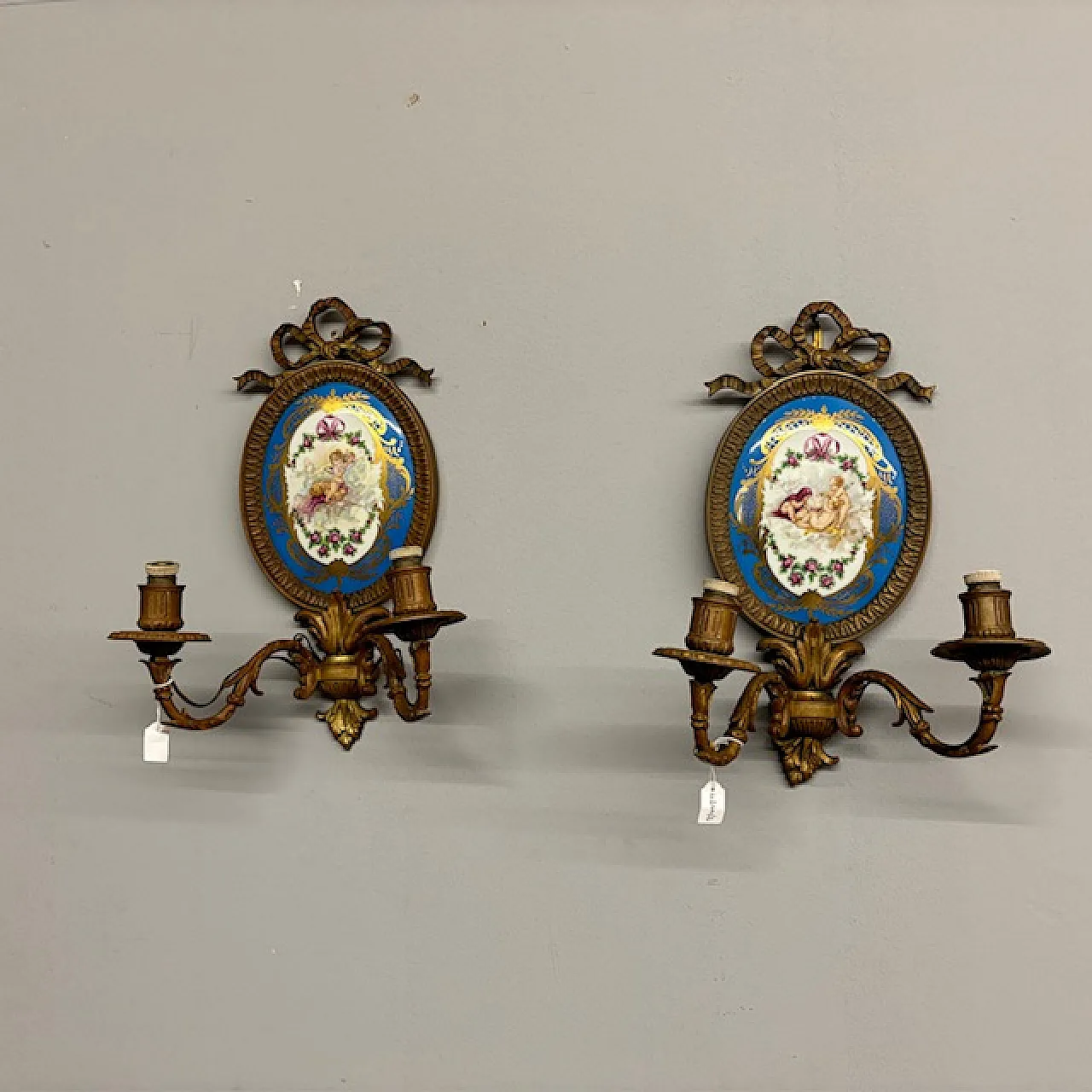 Pair of bronze appliques with painted plaque, early 19th century 1