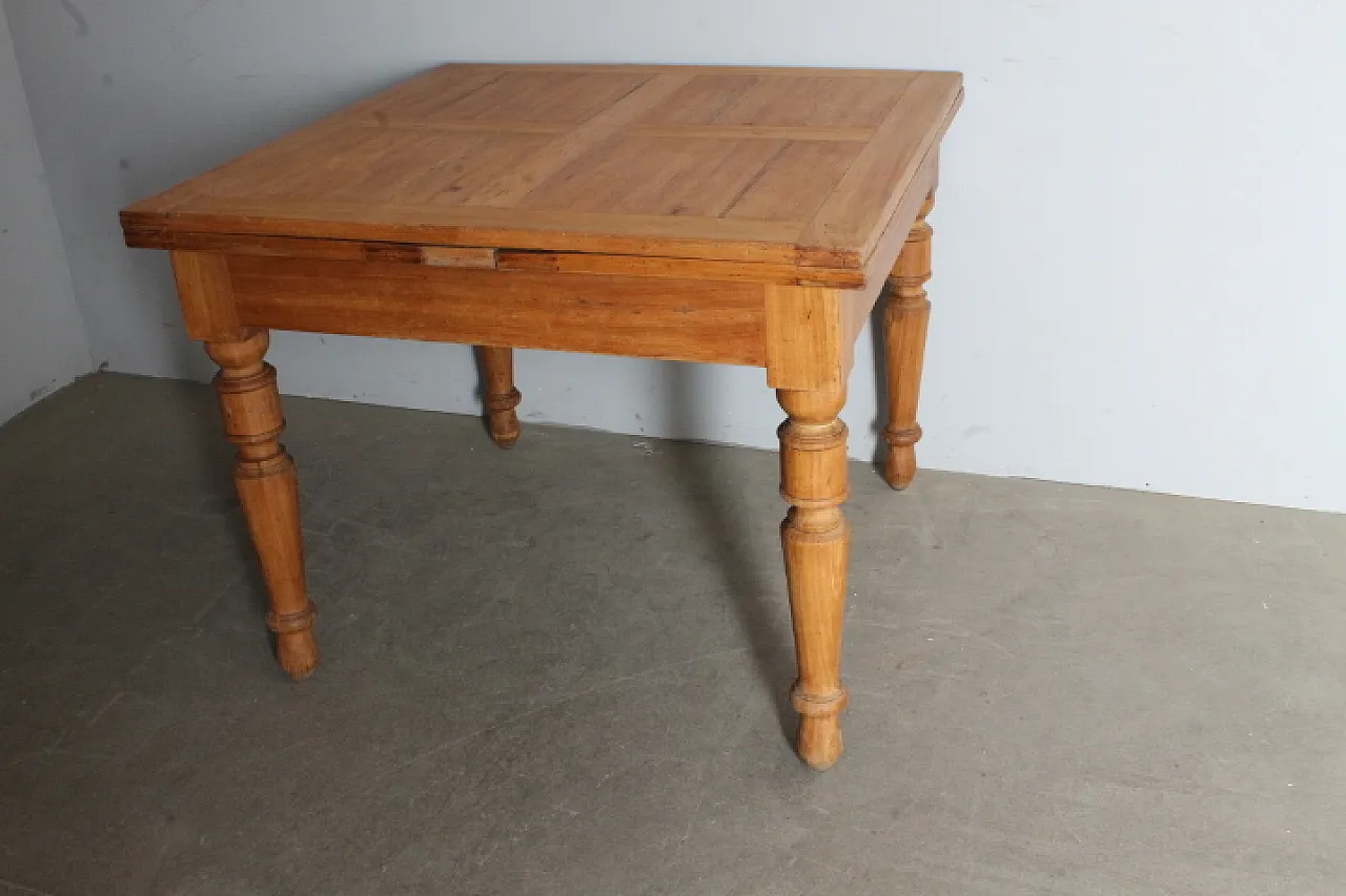 Solid elm table with extensions. 19th century 1