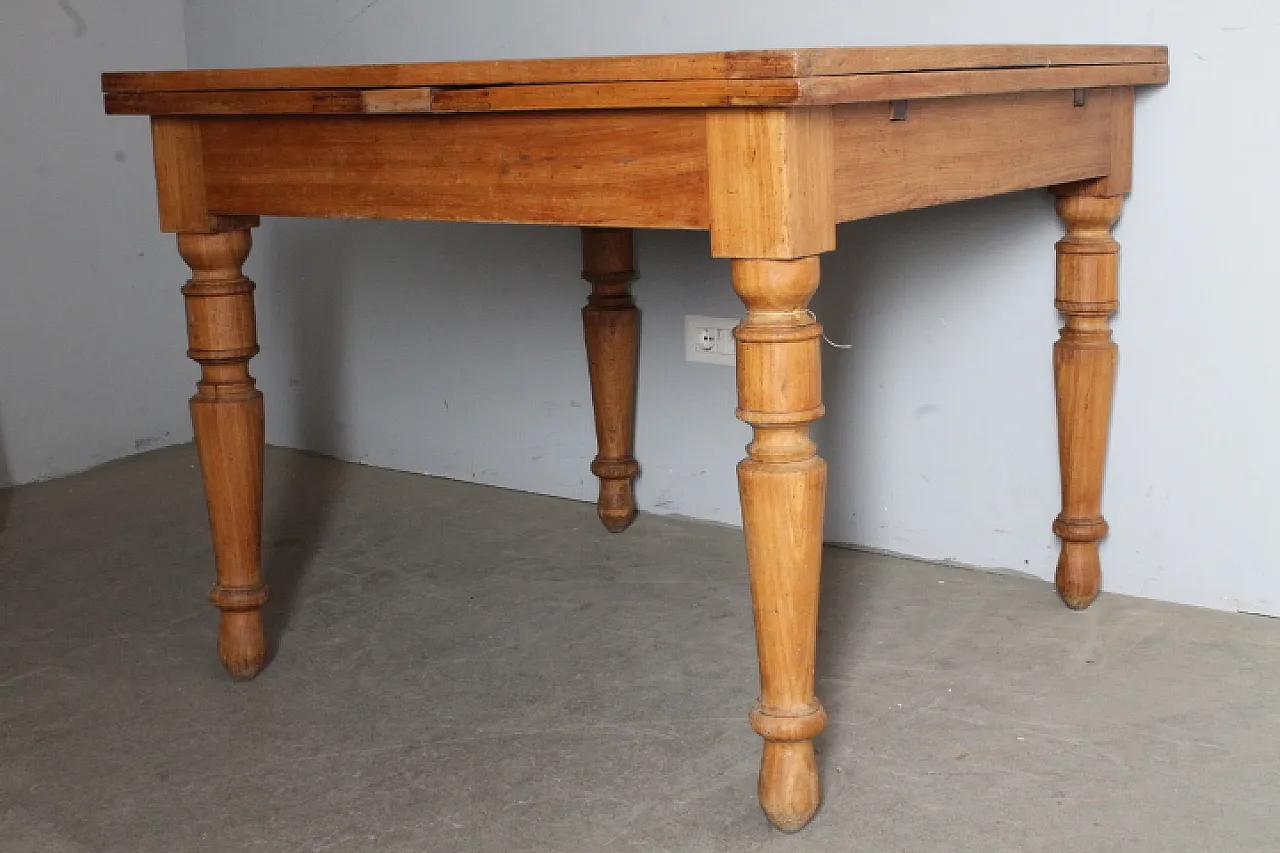 Solid elm table with extensions. 19th century 2