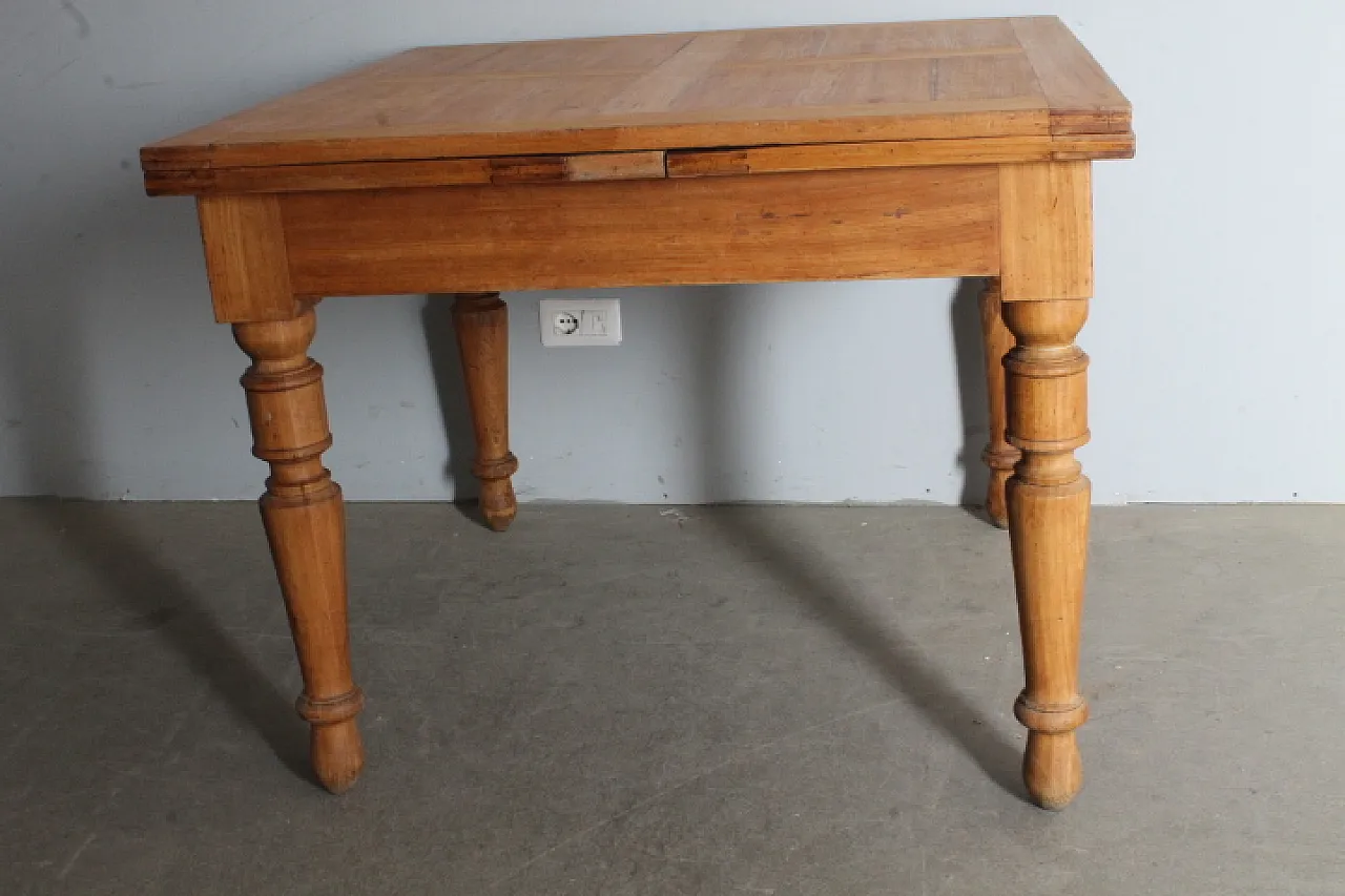 Solid elm table with extensions. 19th century 3