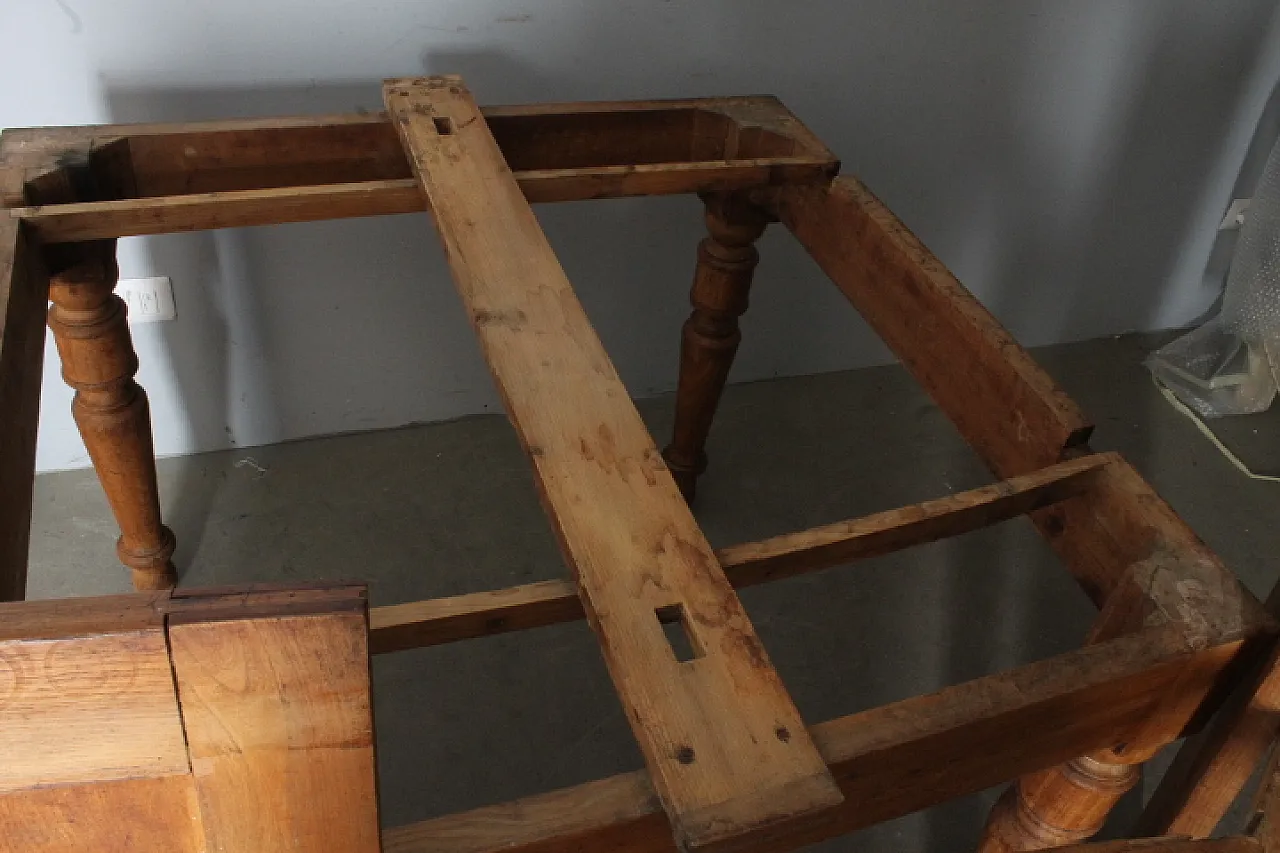 Solid elm table with extensions. 19th century 18