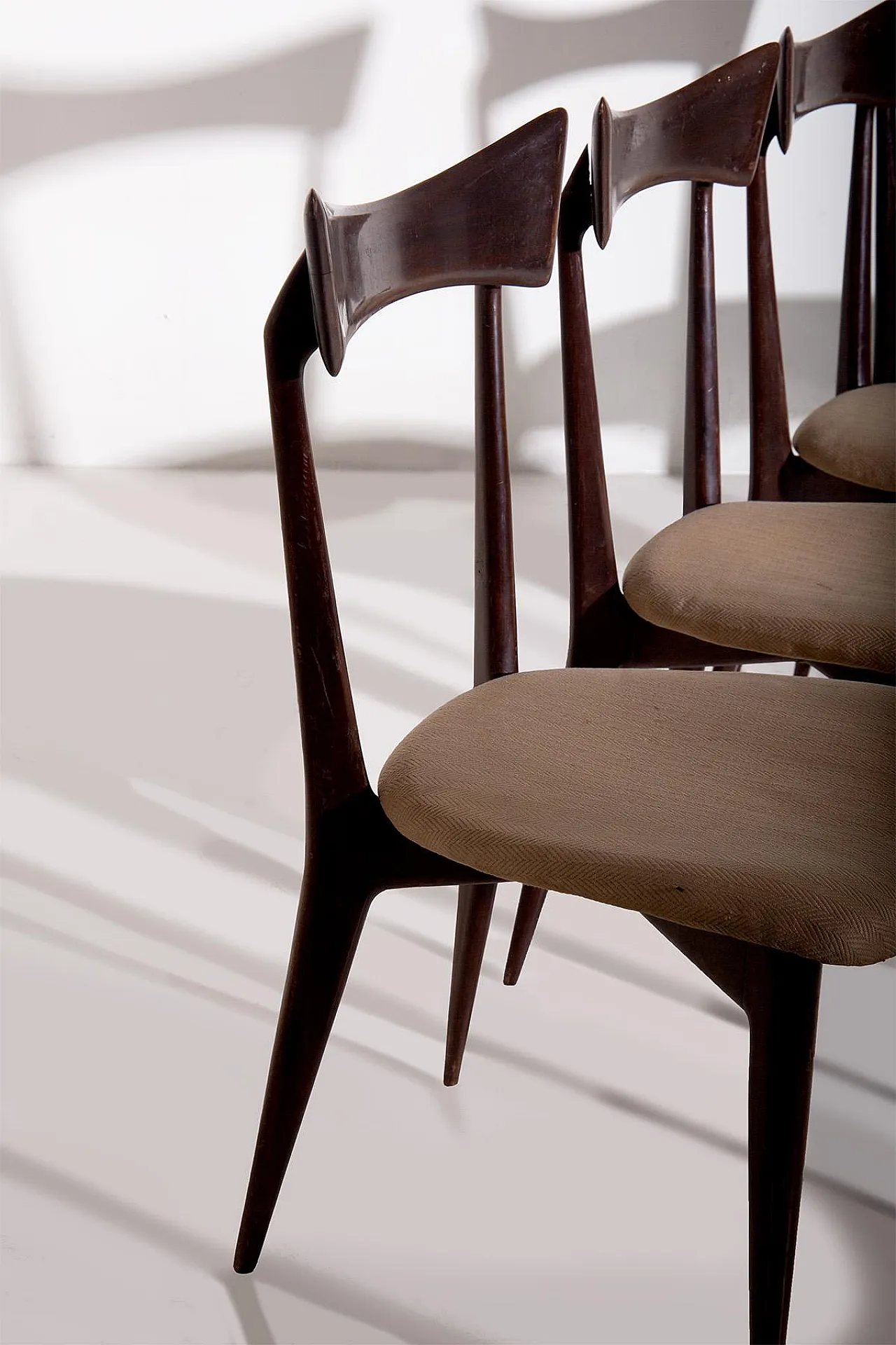 4 Wooden and cotton chairs, 1950s 5