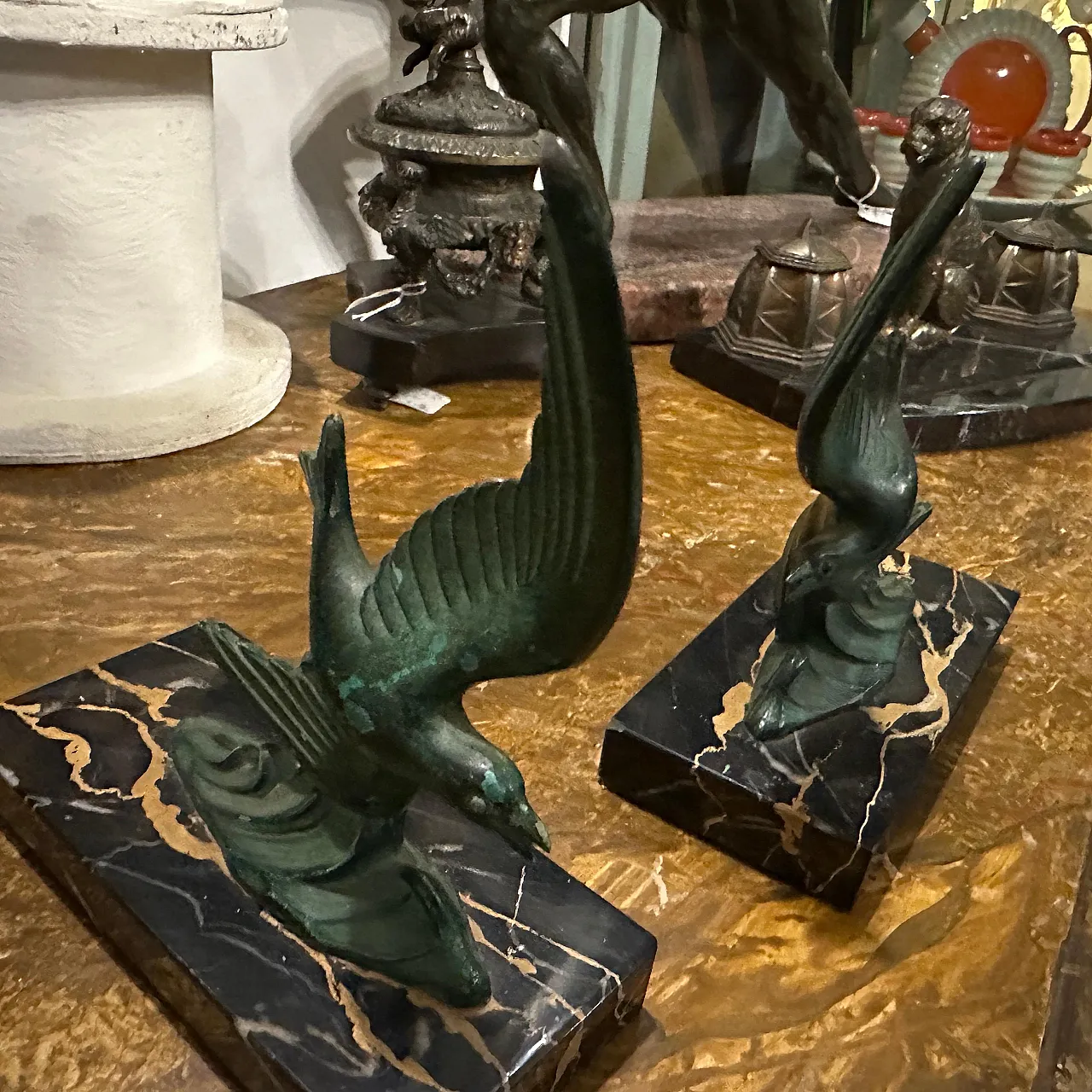 Pair of bird-shaped marble and metal bookcase holders, 1930s 9