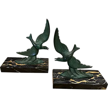 Pair of bird-shaped marble and metal bookcase holders, 1930s