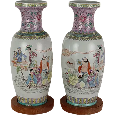 Pair of porcelain and wood vases, 20th century