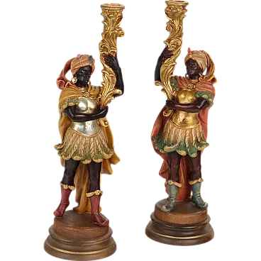 Pair of Moretti wooden candleholders, 20th century