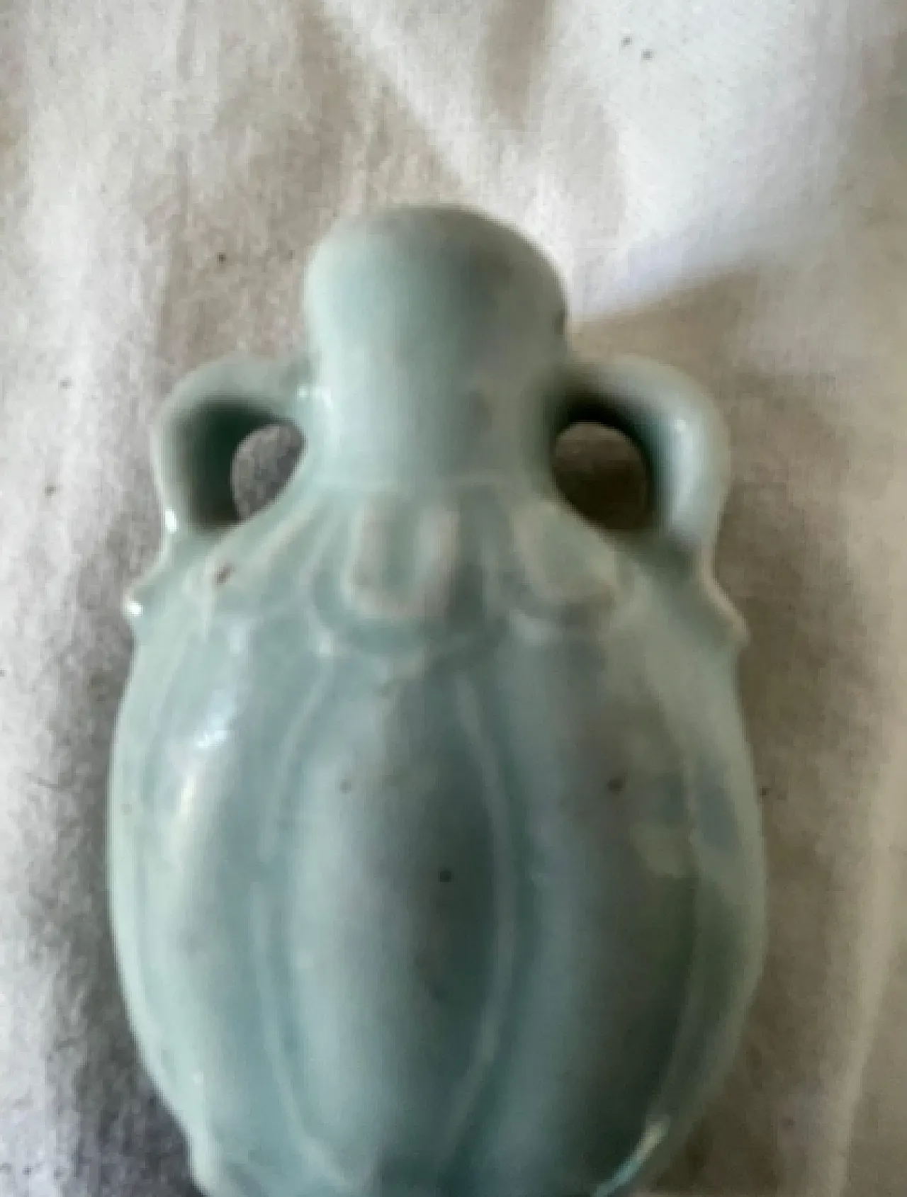 Light green Chinese bottle with relief panels, 19th century 6