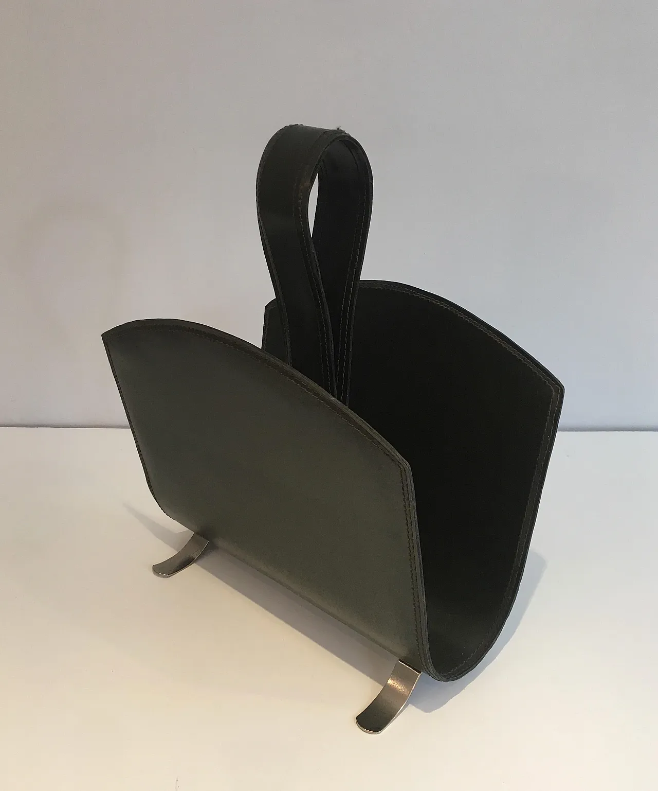 Leather magazine rack on a brushed steel base, 1950s 14