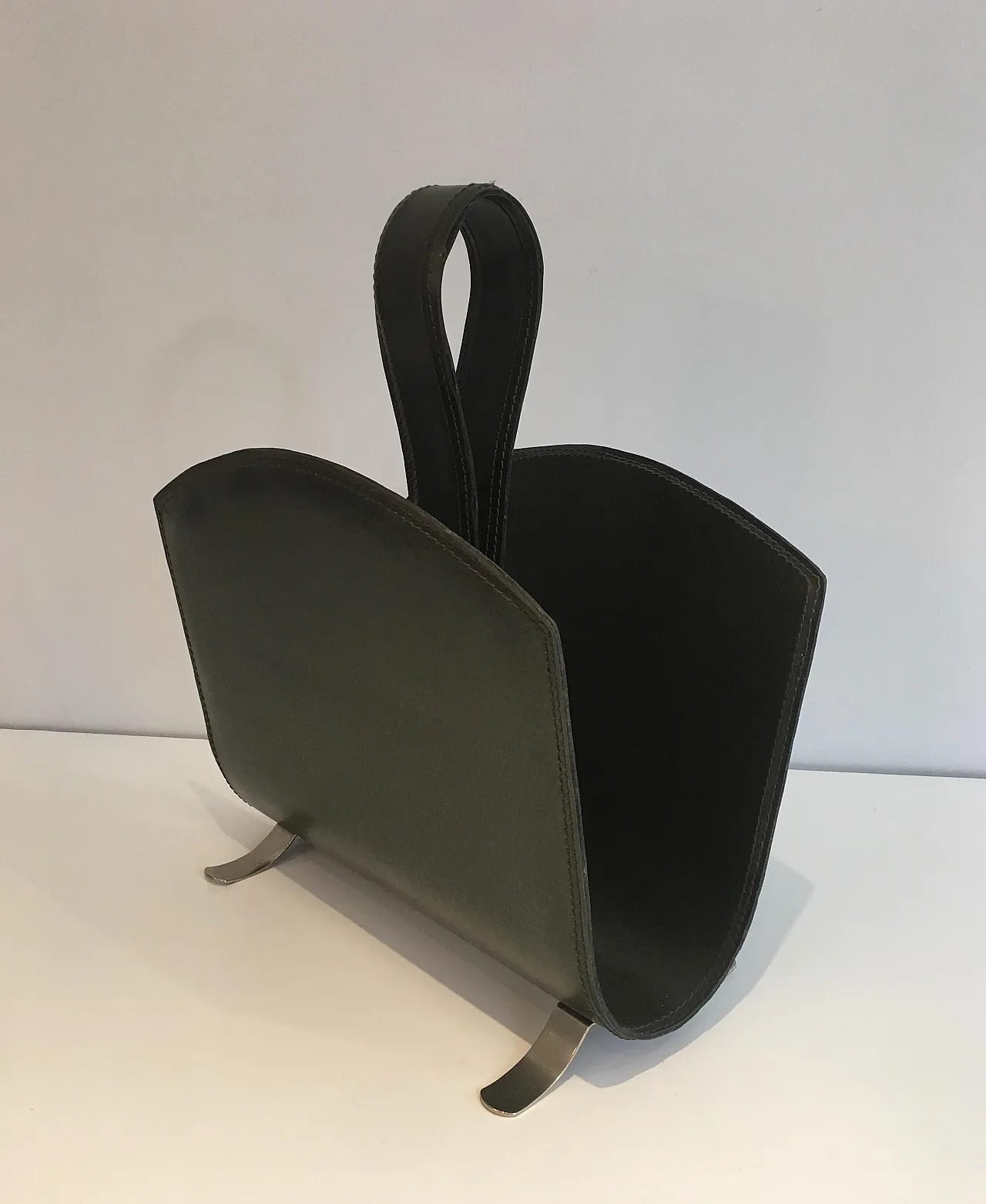 Leather magazine rack on a brushed steel base, 1950s 15