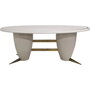 Oval table in white lacquered wood