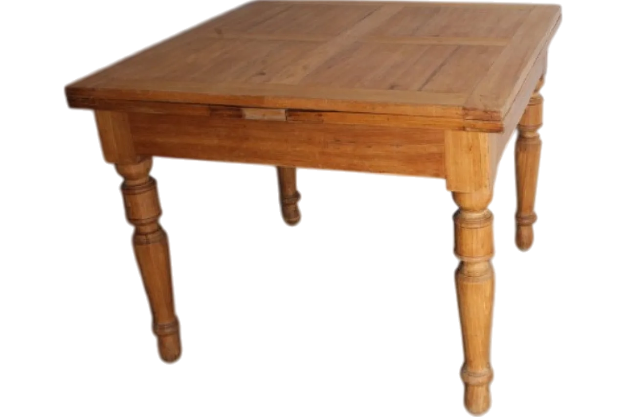 Solid elm table with extensions. 19th century 20