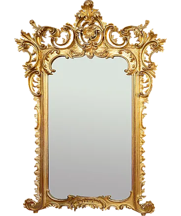 Antique Louis Philippe mirror in gilded and carved wood. Naples