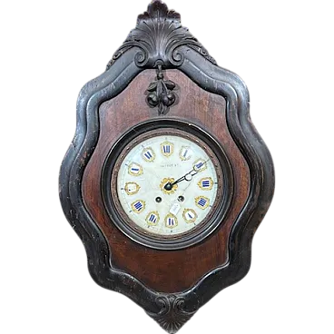 Walnut and rosewood “Ox's eye” wall clock, 1850