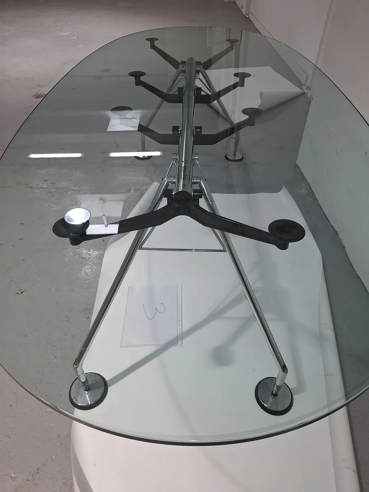 Oval glass and metal table by Norman Foster for Tecno, 2000s 11