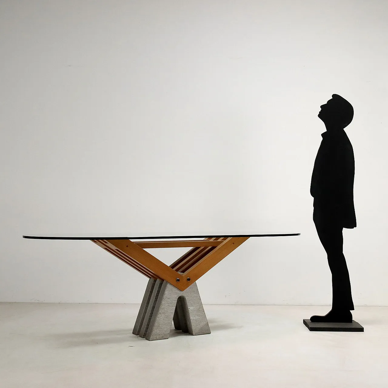 Oval brutalist table in granite, wood and glass, 2000s 2