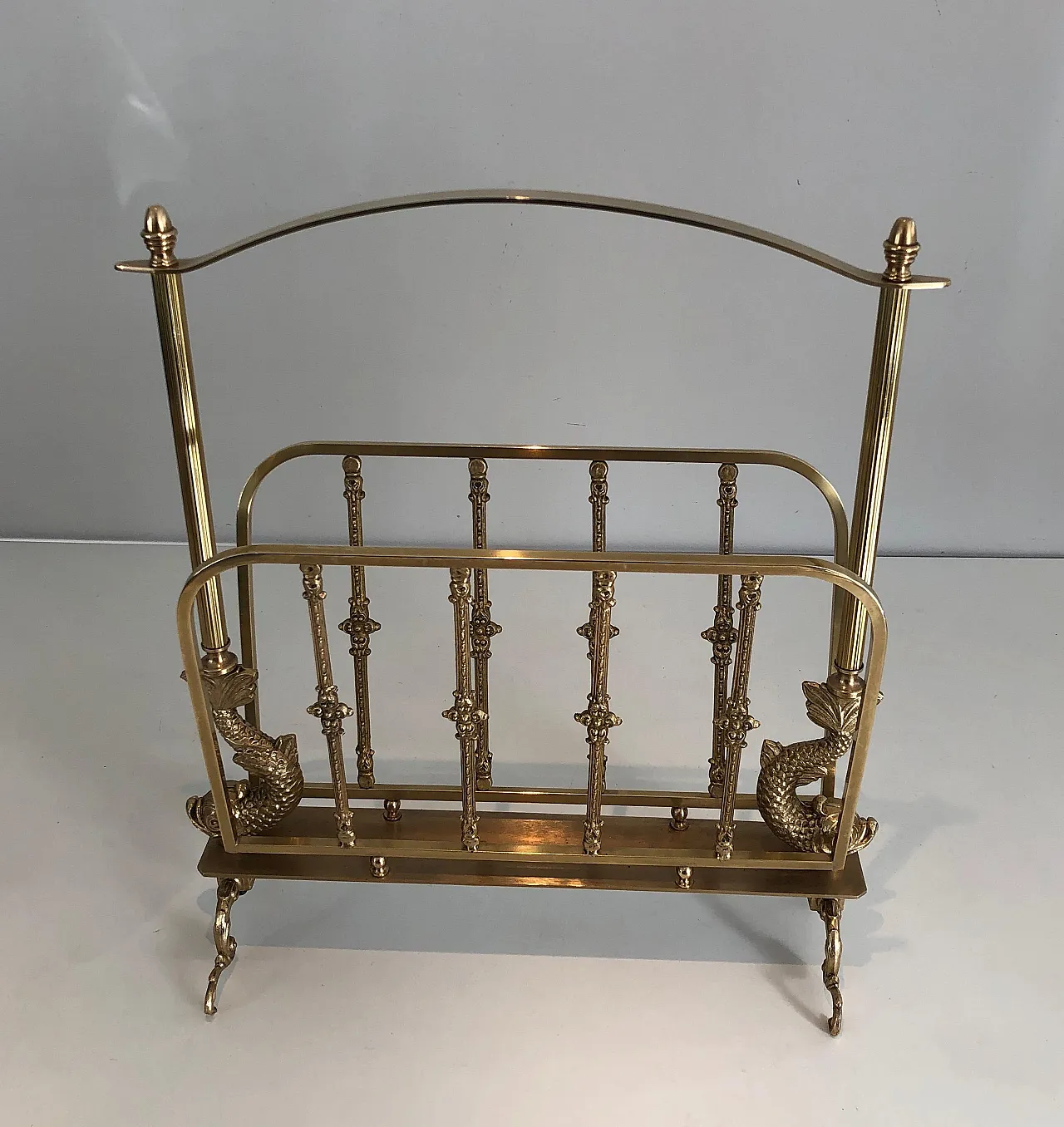 Brass magazine rack with dolphin heads by Maison Jansen, 1940s 2