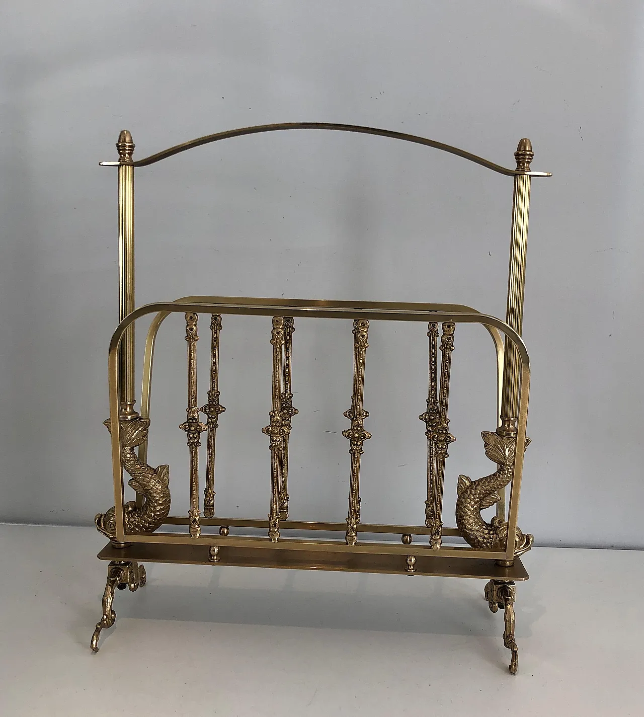 Brass magazine rack with dolphin heads by Maison Jansen, 1940s 3