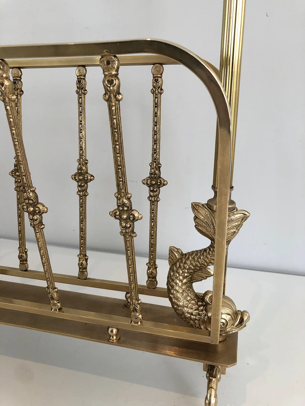 Brass magazine rack with dolphin heads by Maison Jansen, 1940s 5