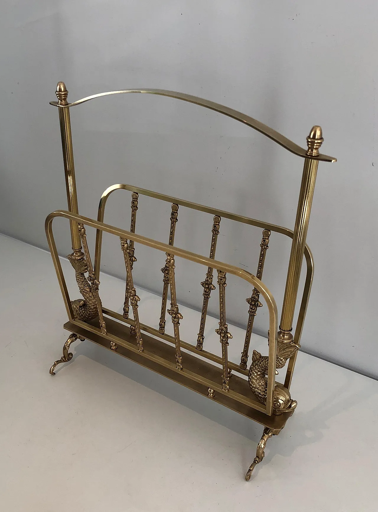 Brass magazine rack with dolphin heads by Maison Jansen, 1940s 9