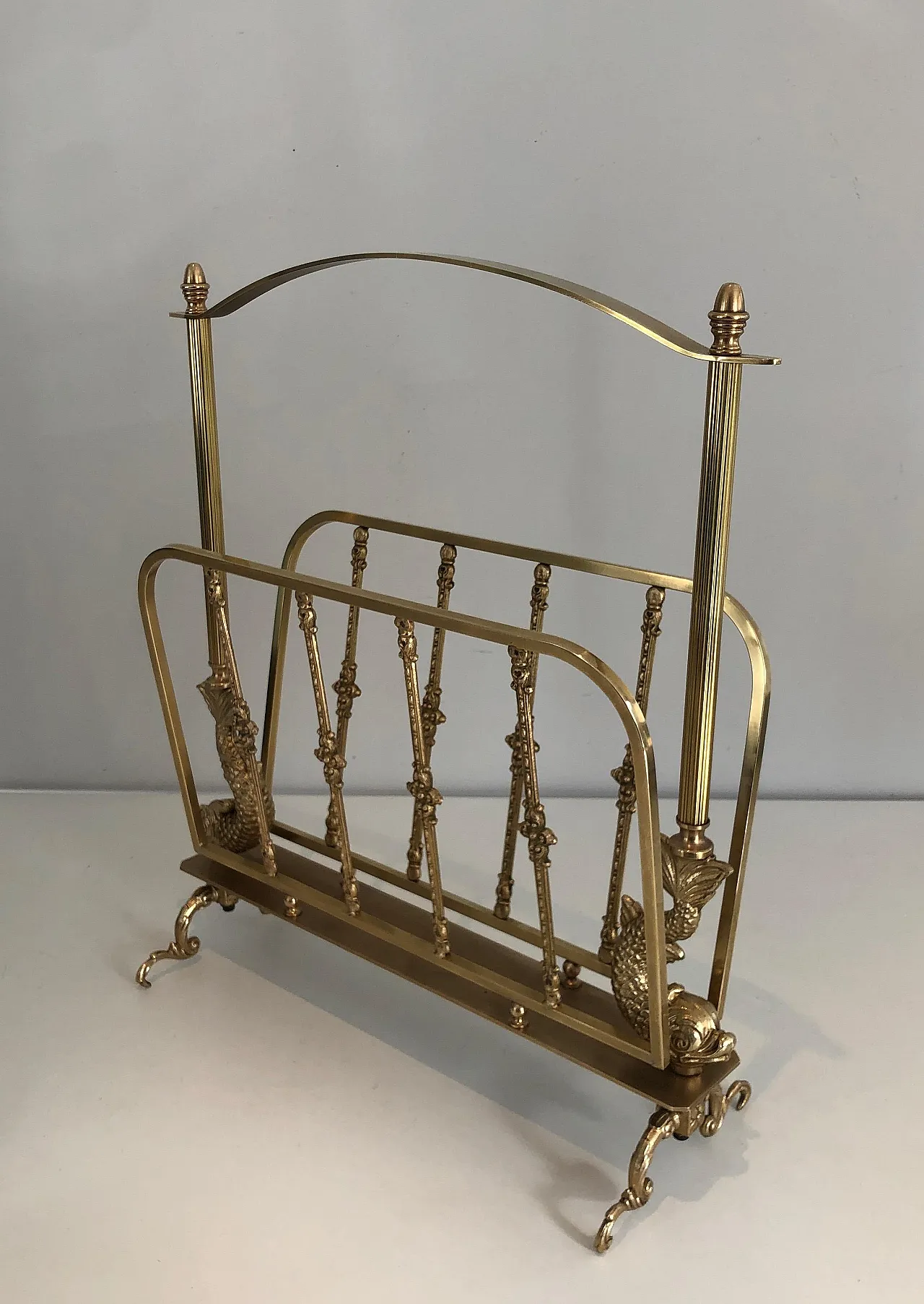 Brass magazine rack with dolphin heads by Maison Jansen, 1940s 16