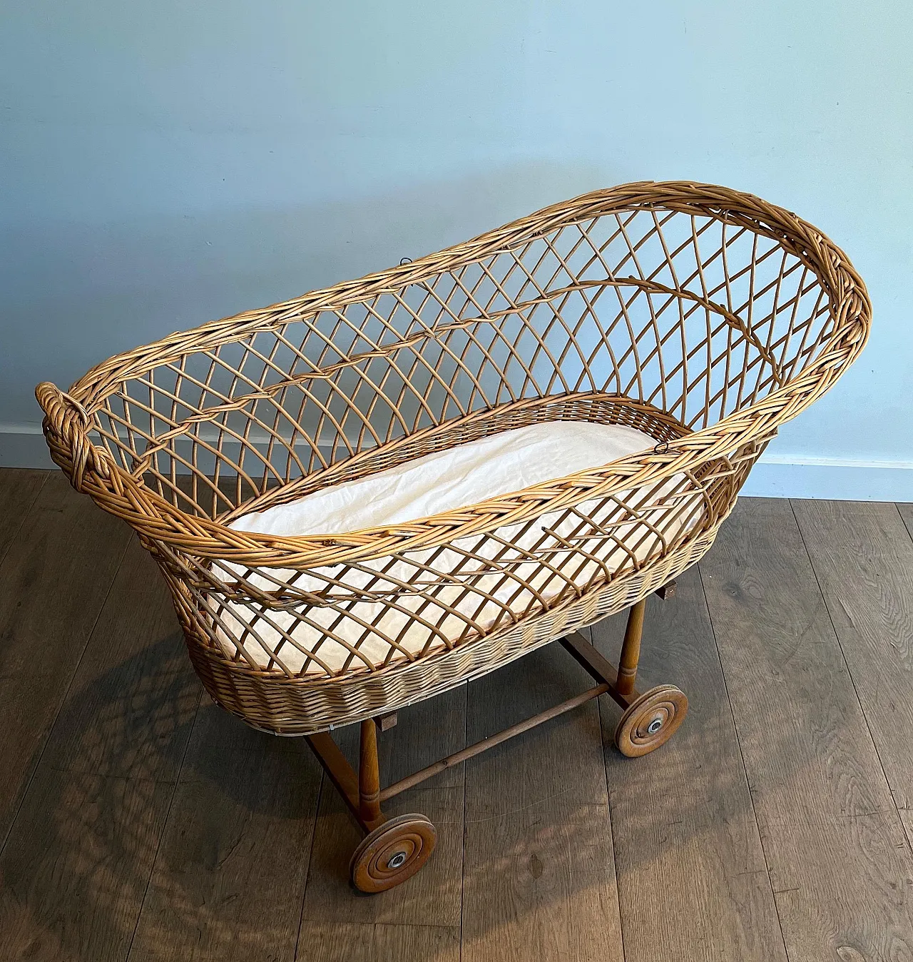 Rattan cradle on castors, 1950s 3