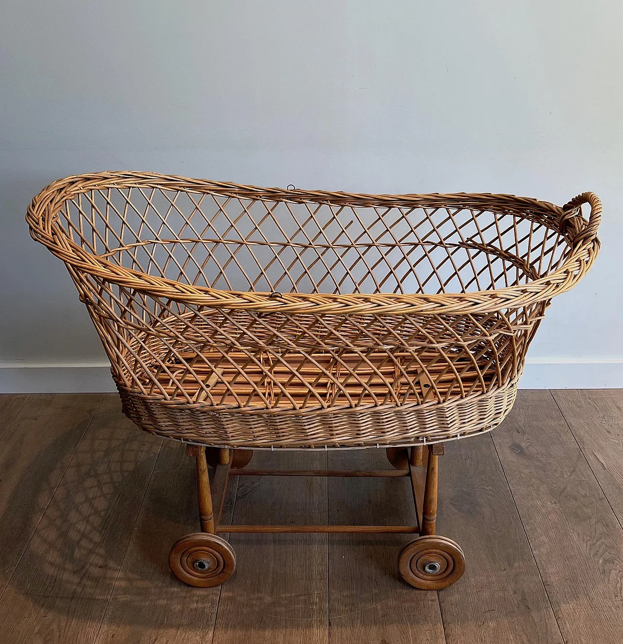 Rattan cradle on castors, 1950s 5