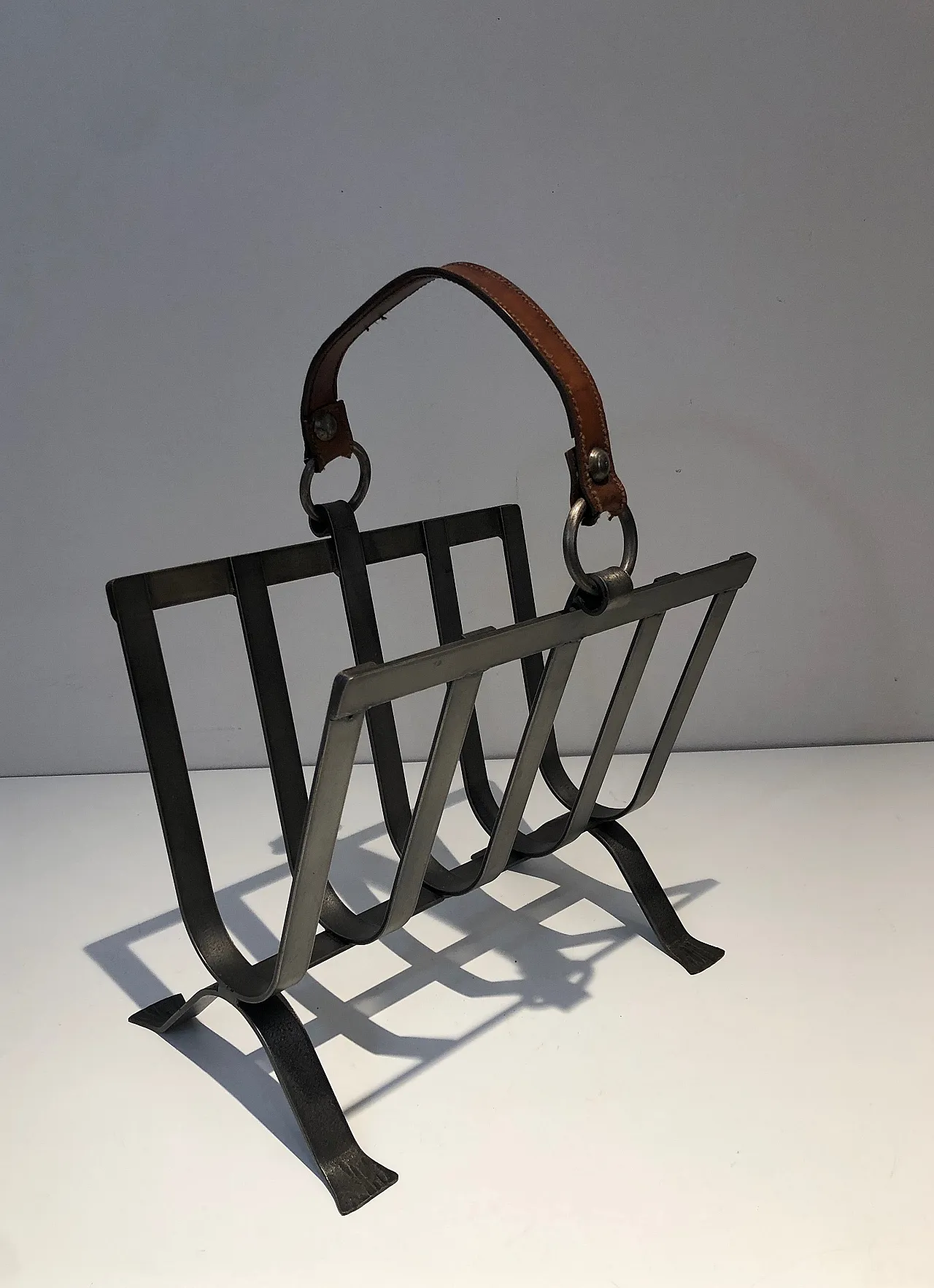 Steel and leather magazine rack, 1950s 1