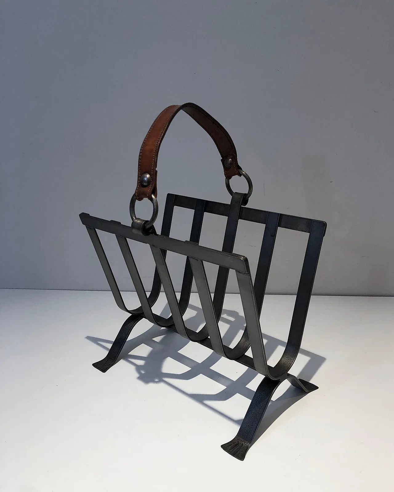 Steel and leather magazine rack, 1950s 5