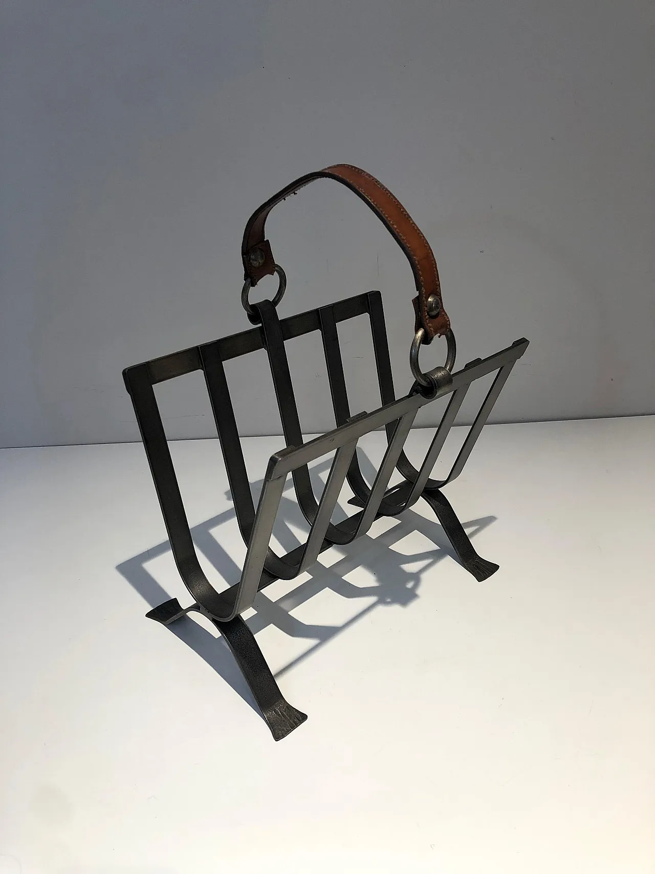 Steel and leather magazine rack, 1950s 11