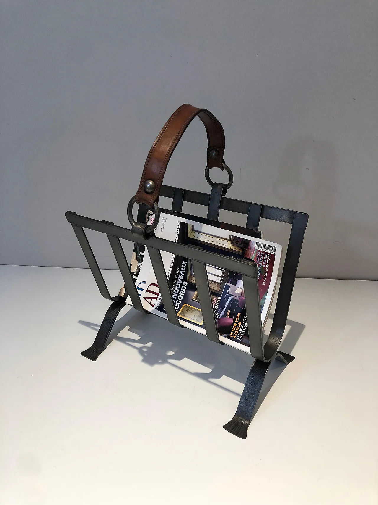 Steel and leather magazine rack, 1950s 14