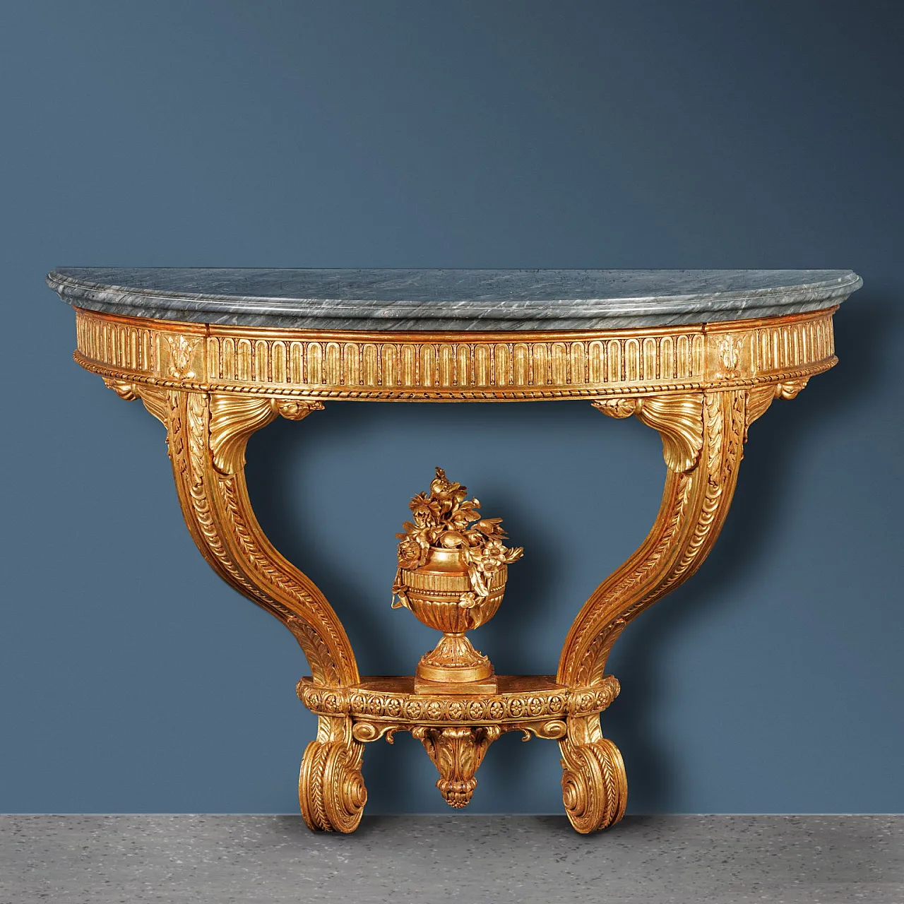 Demi lune gilded console with marble top, beginning 19th century 1