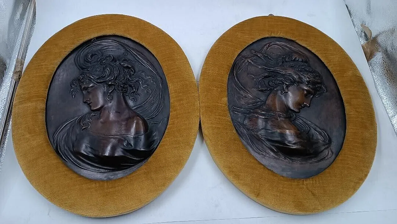 Pair of Art Nouveau bronze embossments with female faces, 20th century 1