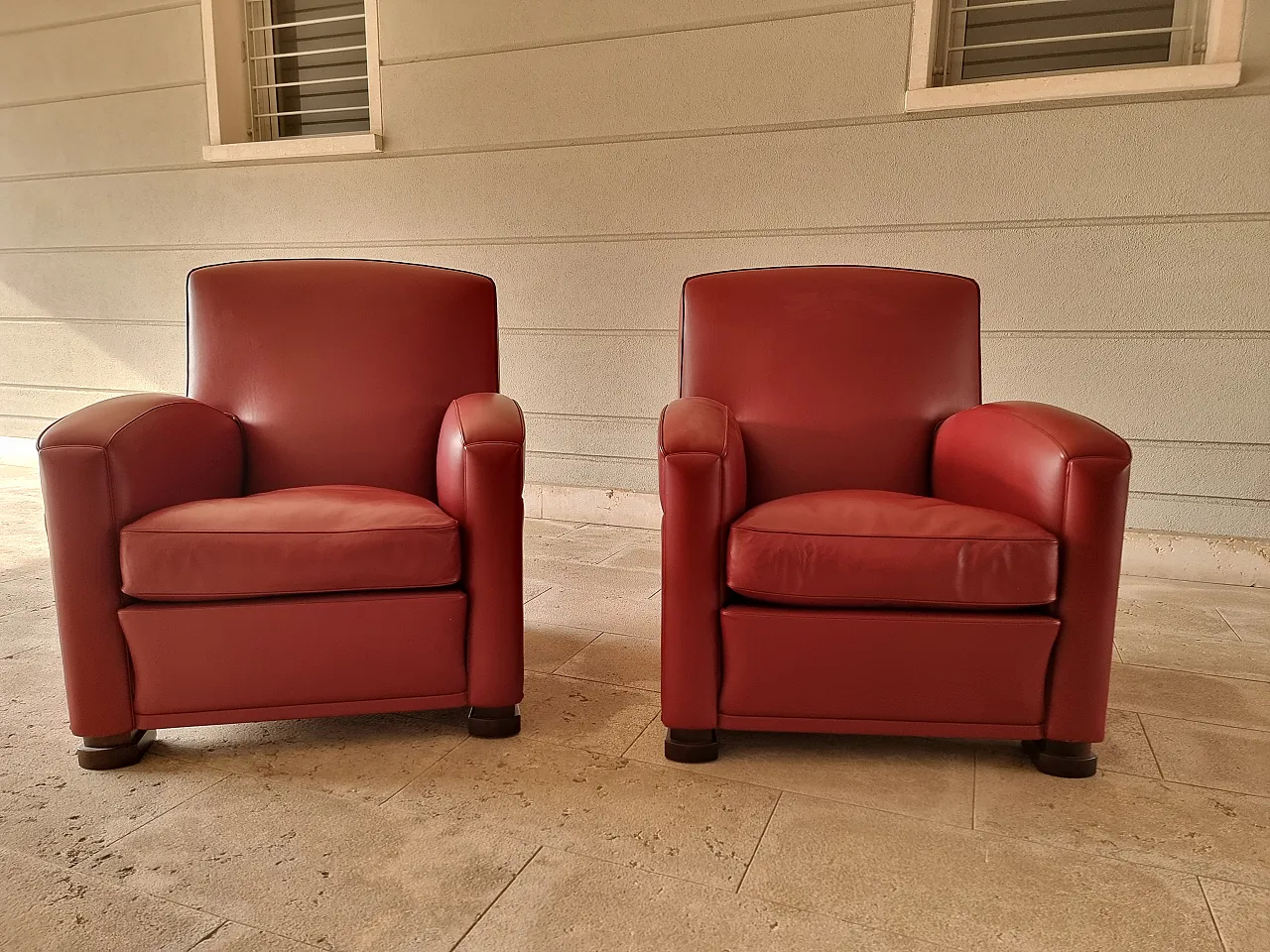 Pair of red armchairs, 90s 1