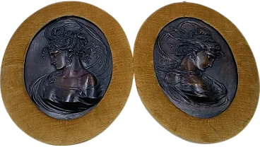 Pair of Art Nouveau bronze embossments with female faces, 20th century