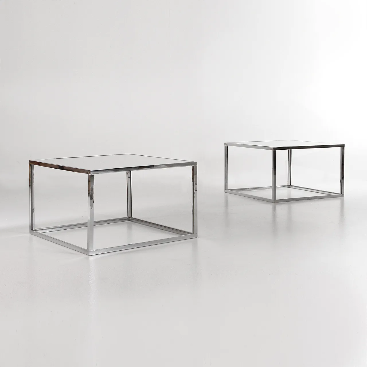 Pair of glass and chrome-plated metal coffee tables, 1970s 1