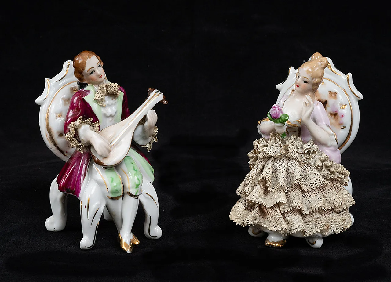 Pair of polychrome porcelain sculptures genre scene, 20th century 1