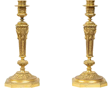 Pair of ancient golden bronze candlesticks, France, 19th century.