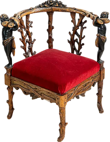 Sculptural French corner armchair in solid walnut, early 19th century